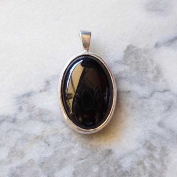 Small black oval pendant